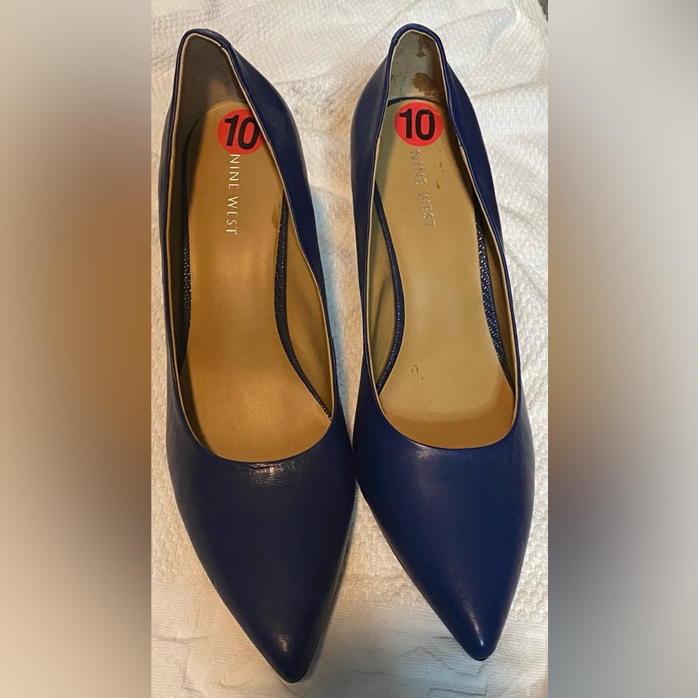 Blue leather pumps. New never worn. Size ten Nine West.